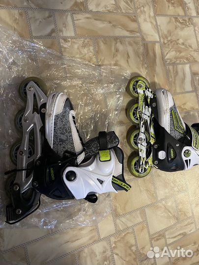 Роликовые коньки