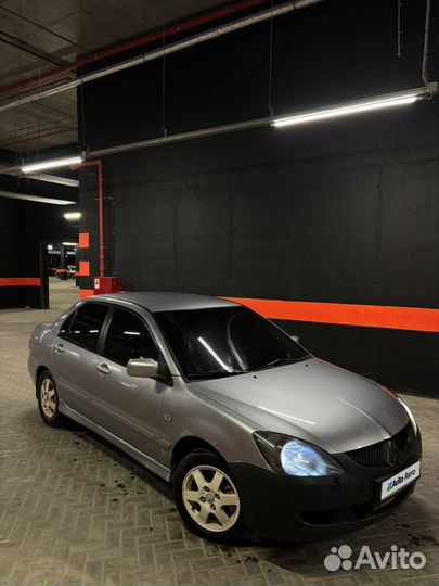 Mitsubishi Lancer 1.6 AT, 2004, 290 000 км