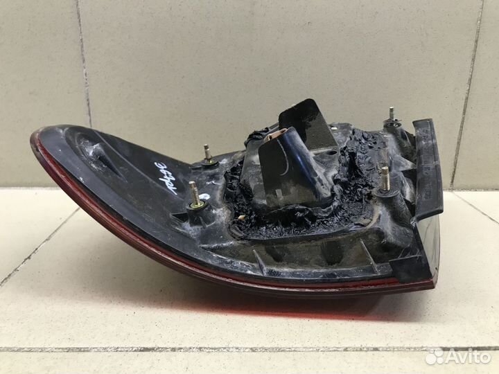 Фонарь задний наружный левый Almera N16 2000-2006