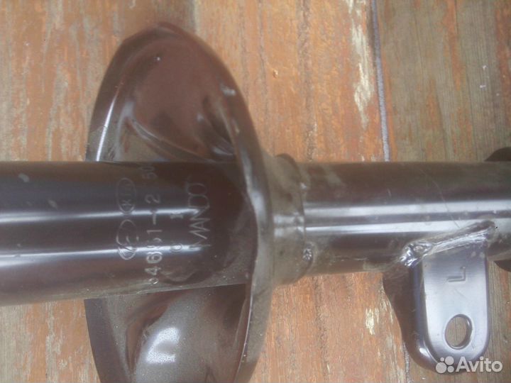 Стойка амортизатора Hyundai-Kia mando левая