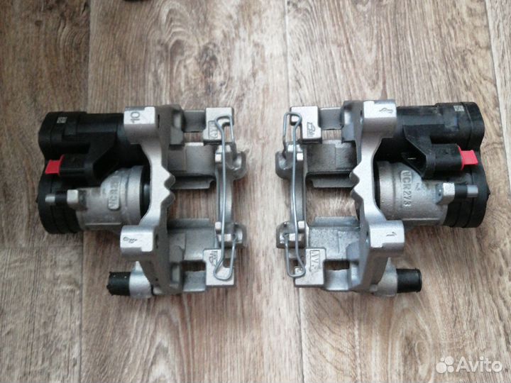 Суппорт задний с элекроручником VAG