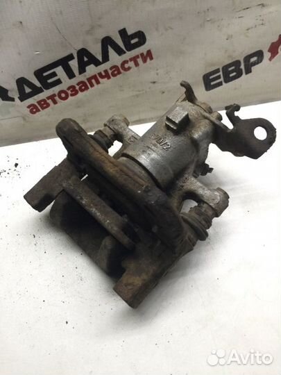 Суппорт тормозной задний правый Renault Megan 2