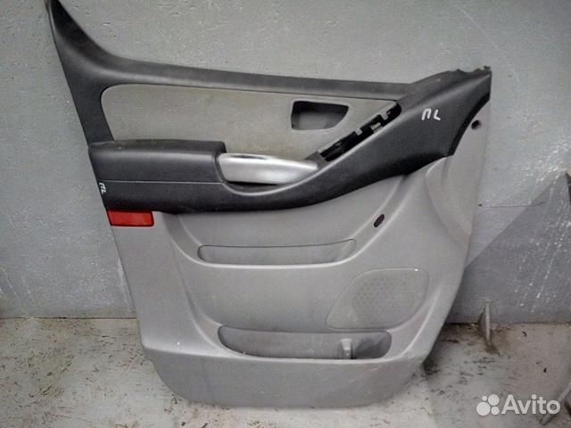 Обшивка двери передней левой Hyundai Grand Starex