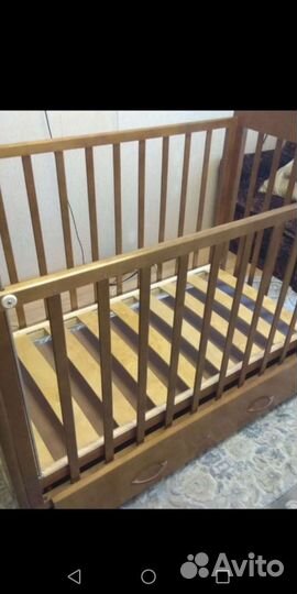 Детская кроватка с маятником и ящиком