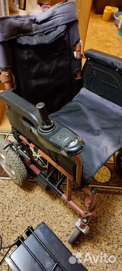 Инвалидная коляска с электроприводом