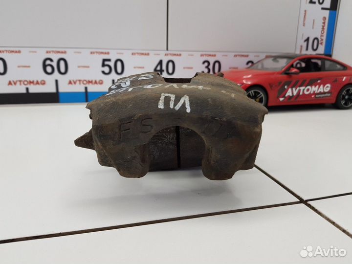 Суппорт передний левый