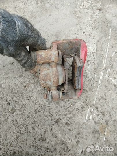 Суппорт тормозной передний правый Kia Pio 1