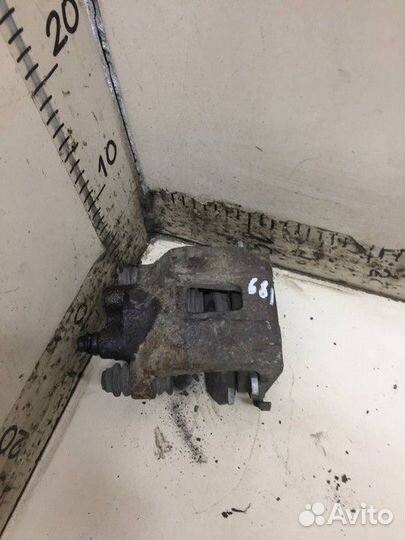 Суппорт задний левый Ford Explorer