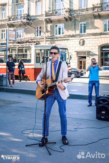 Поющий гитарист