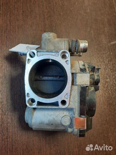 Заслонка дроссельная Опель Астра 1.6