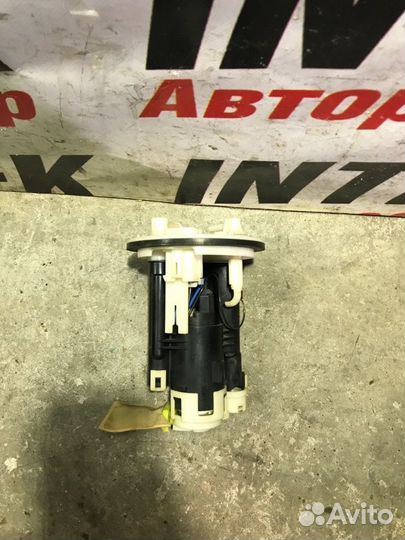 Насос топливный Mitsubishi Lancer 9