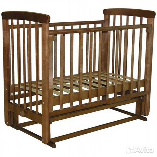 Детская кроватка с маятником
