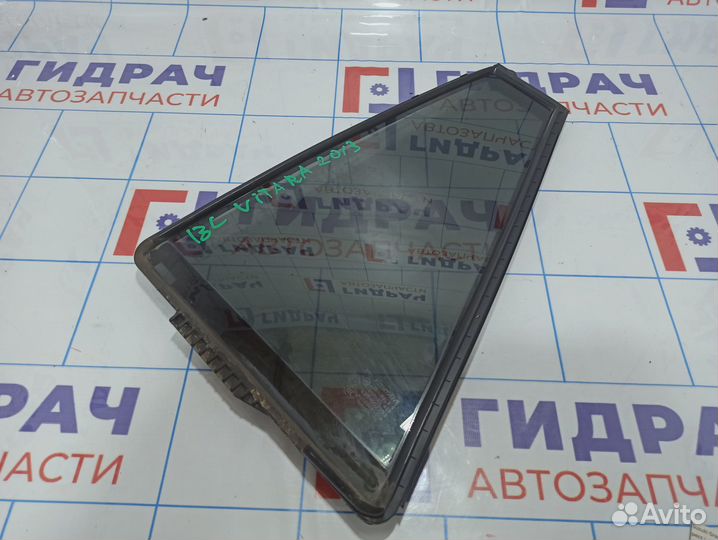 Стекло двери задней левой форточка Suzuki Grand Vi