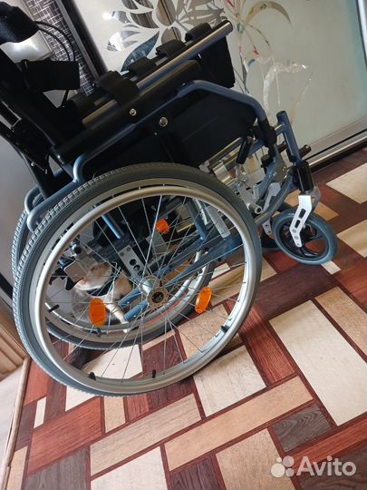 Инвалидная коляска