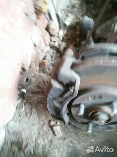 Суппорт передний левый Киа Рио 3