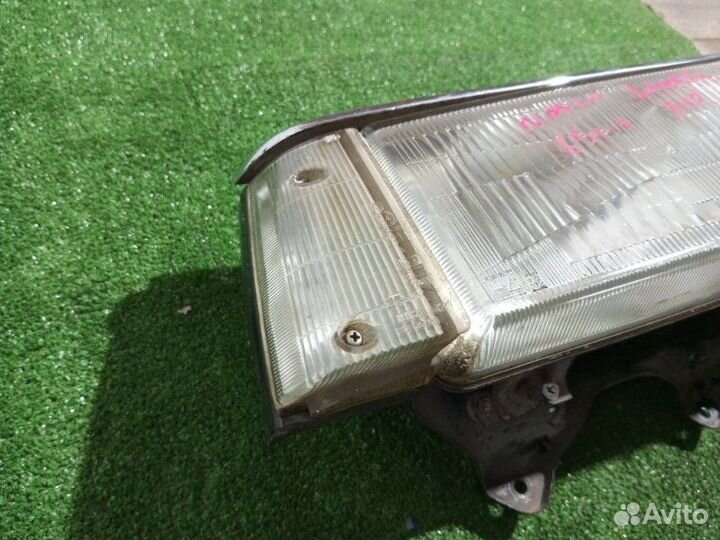 Фара галогеновая правая Nissan Laurel Spirit FB12