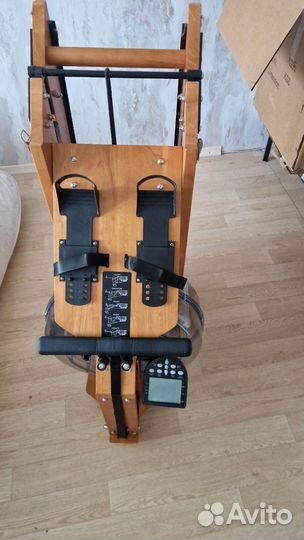 Гребной тренажер новый