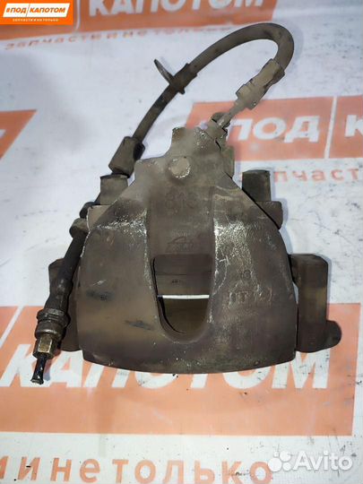 Суппорт тормозной передний левый Ford Focus 3 2011