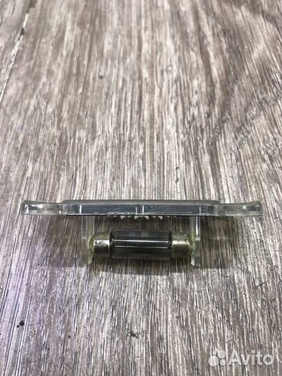 Фонарь подсветки номера задний Mercedes A-Class