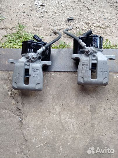 Суппорт задний левый, правый audi q3 2012