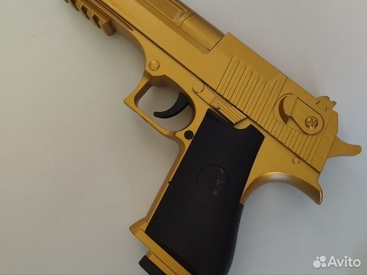 Игрушечный пистолет