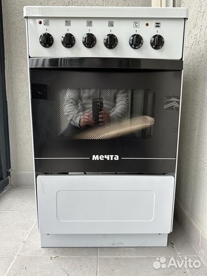 Электроплита с духовкой новая