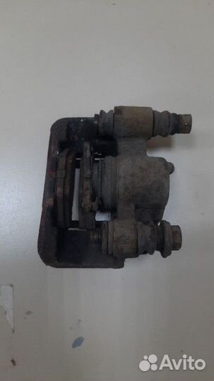 Суппорт задний левый Toyota Corolla