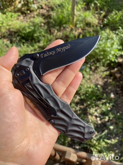 Складной нож с гравировкой