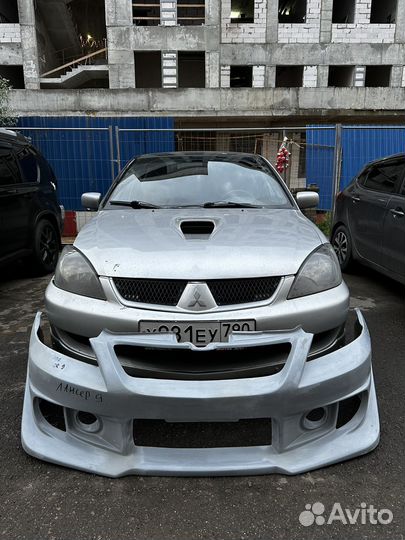 Бампер передний Ланцер 9 Accolade