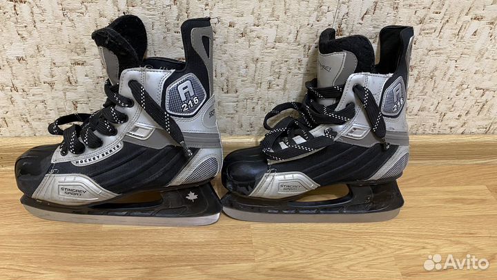 Коньки детские с клюшками и шайбой