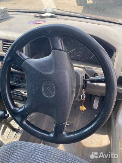 Руль Mazda Demio DW3W