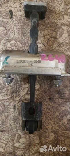 Ограничитель двери передний левый Opel Corsa D