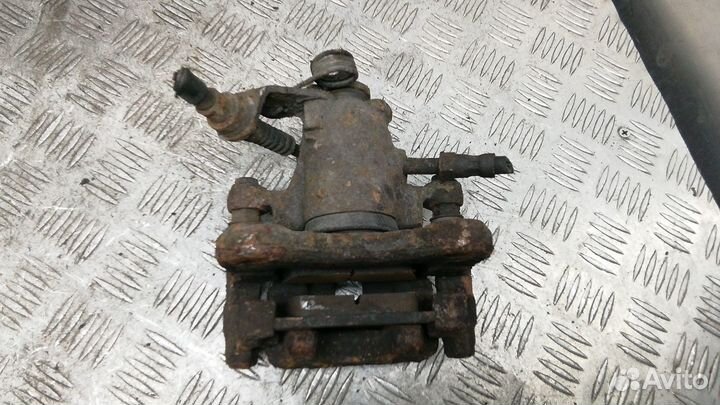 Суппорт задний левый Volkswagen Sharan рест. 2002