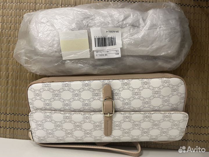 Сумка кожаная с рисунком из перфорации