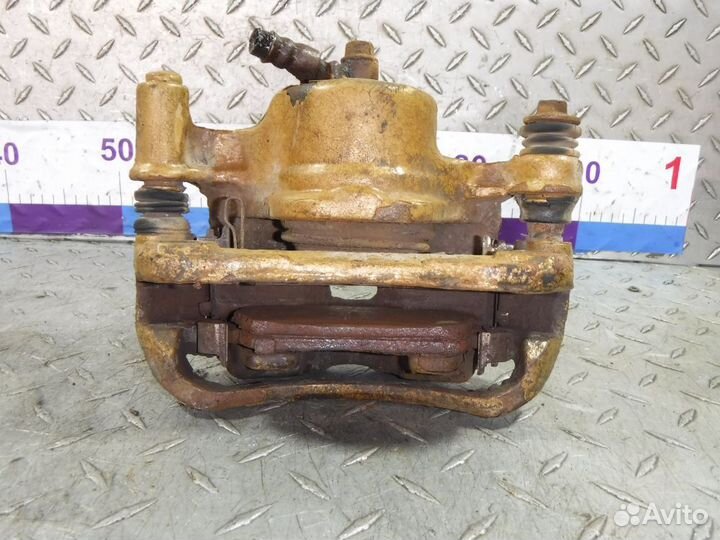 Суппорт передний левый Hyundai Avante II