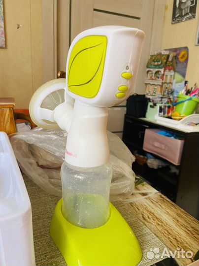 Молокоотсос электрический Ramili