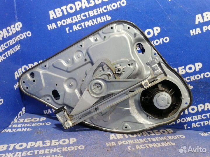 Задний правый стеклоподъемник Ford Focus 2 седан