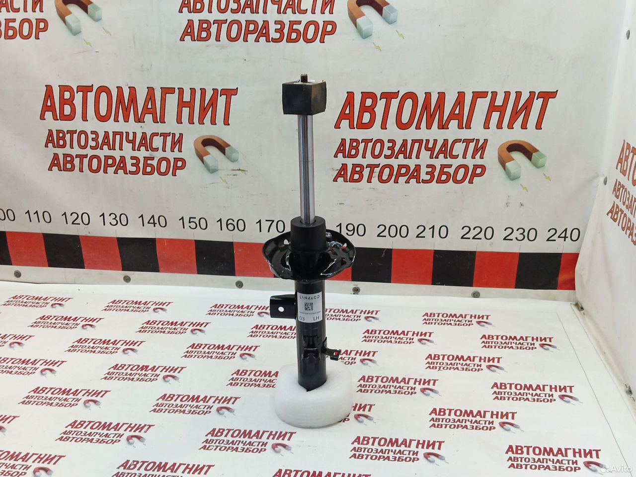 Амортизатор стойка передняя левая Джили Монжаро