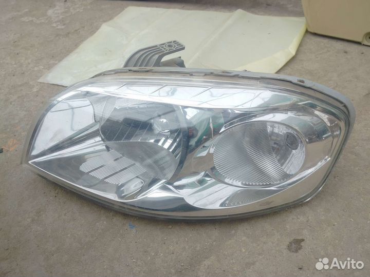Фара левая Chevrolet Aveo T250