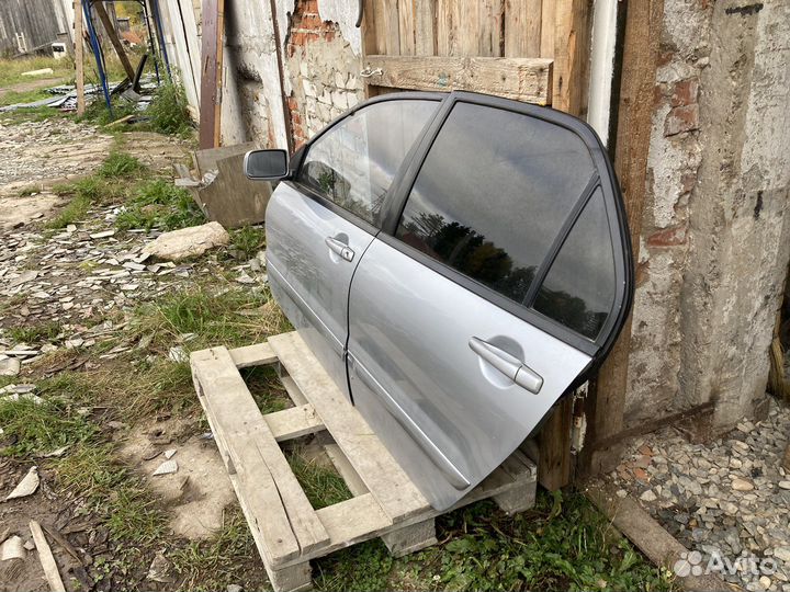 Двери левые mitsubishi lancer 9