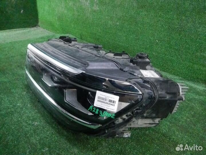 Фара левая Volkswagen Tiguan