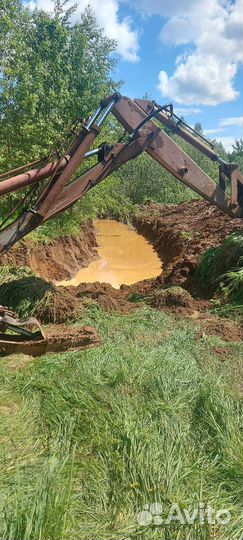 Услуги экскаватора погрузчика