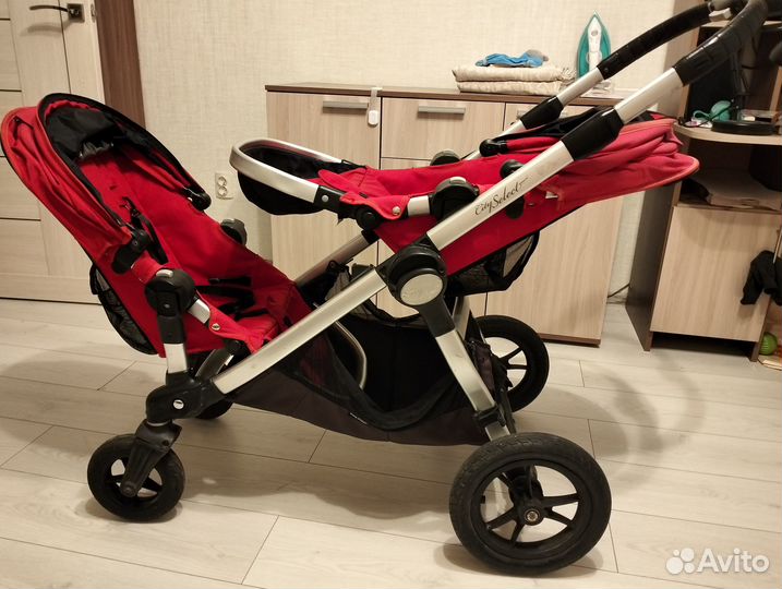 Коляска для погодок baby jogger city select