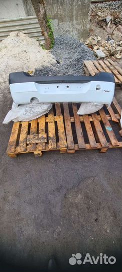 Задний бампер Renault Logan фаза 1