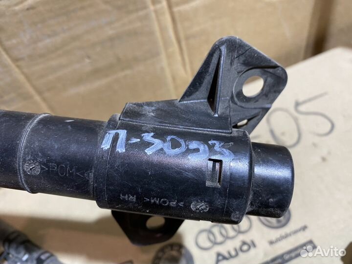 Форсунка омывателя фары правой KIA Sportage 3