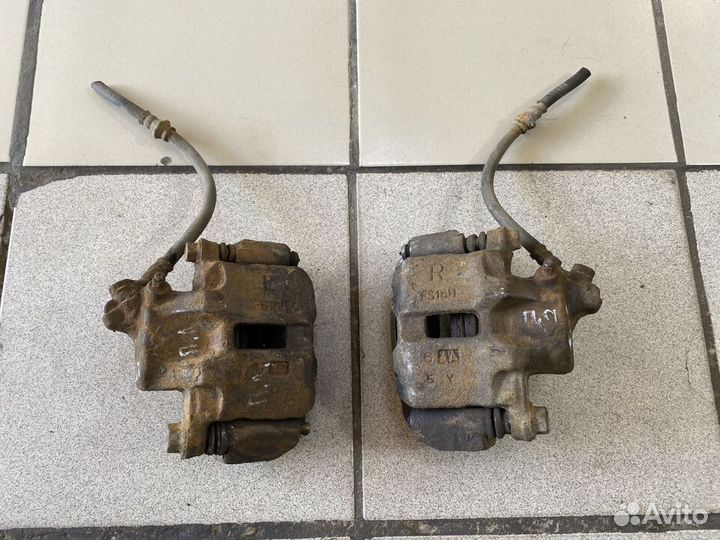 Суппорт передний Mitsubishi Lancer VII