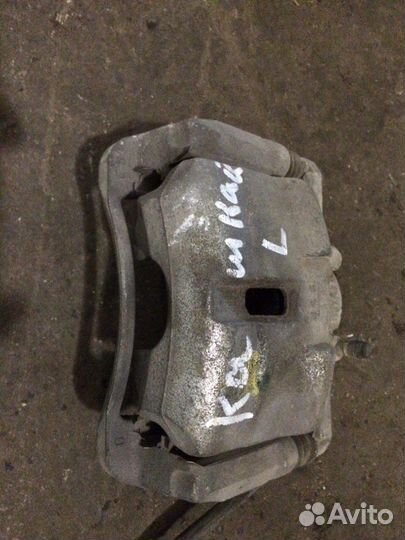 Суппорт передний левый nissan Qashqai (J10) 2006