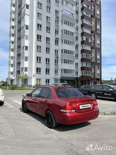 Mitsubishi Lancer 1.6 МТ, 2004, битый, 243 000 км