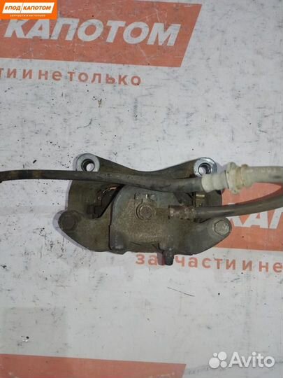 Суппорт тормозной передний левый Nissan Teana J32