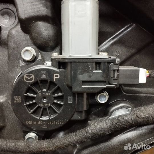 Стеклоподъемник электрический передний левый Mazda